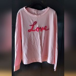 Pink women's sweater.
